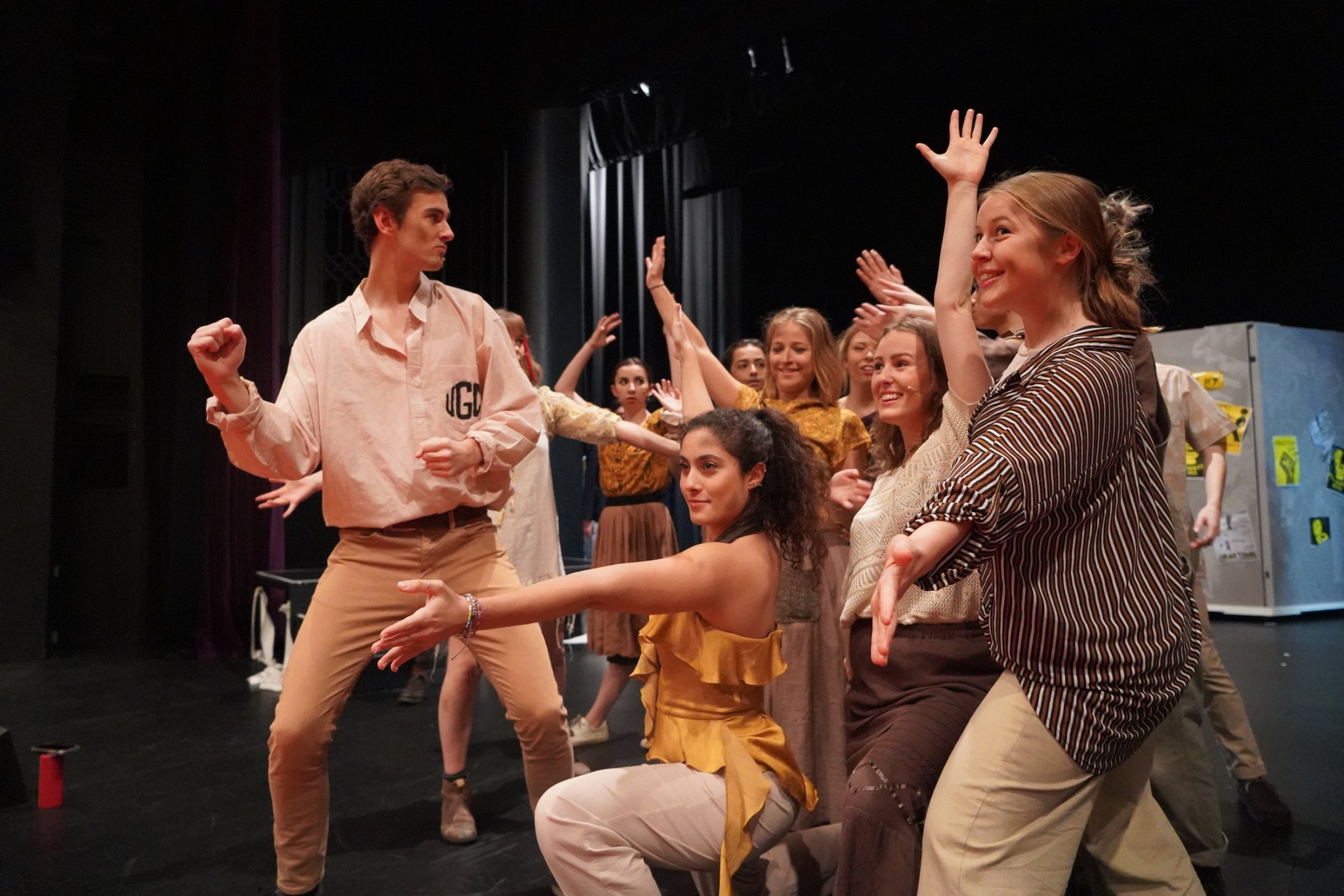 Happy students performing